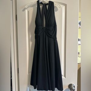Black cocktail dress, Marylin Monroe style, deep V
